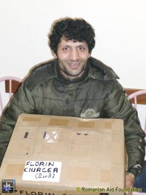 Florin Ciurcea
Florin receives a designated box sent by a supporter in England.
Keywords: Feb13;GChoice1303m12