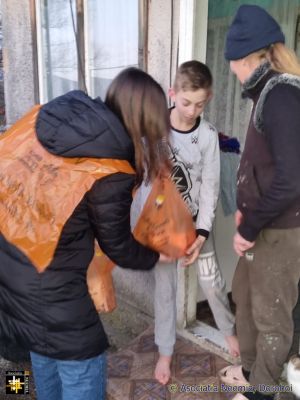 Food Distribution
A family receives food donated by the customers of a local supermarket
Keywords: dec24;pub2501j